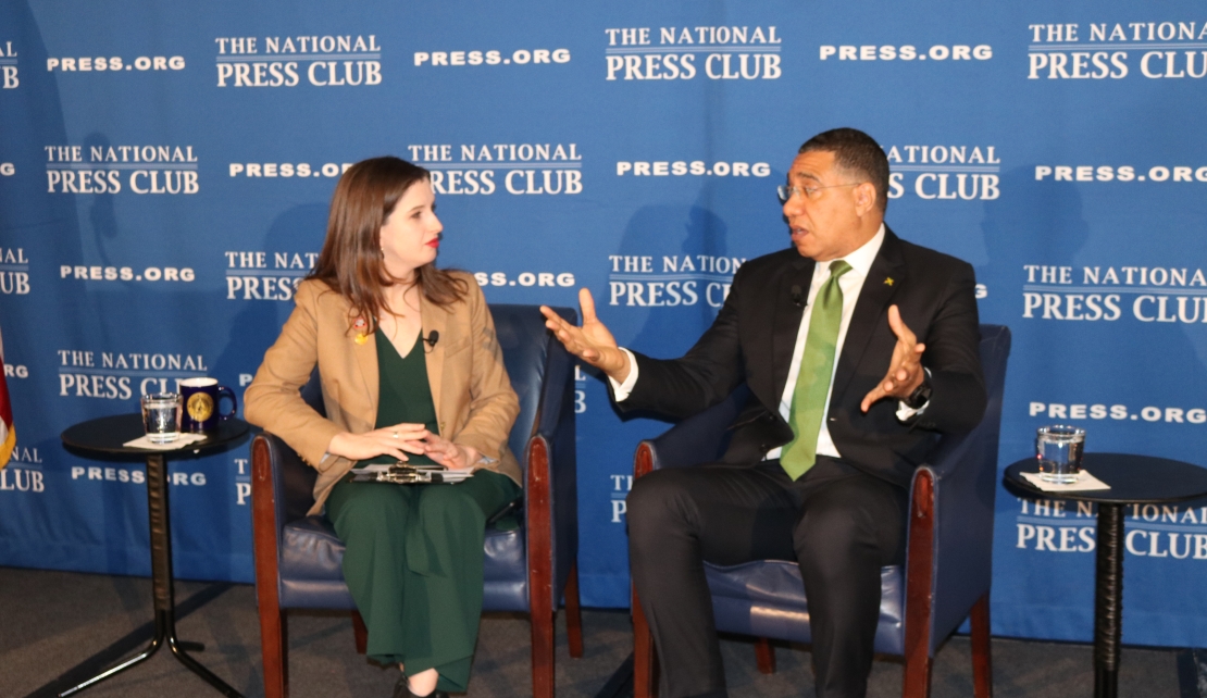 Prime Minister Andreew Holness has the rapped attention of interviewer Emily Wilkins of the Washington National Press Club as he responds to questions from the Washington media.( Photo Derrick Scott)